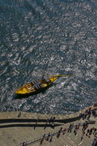 high level view of a rabelo boat used for transporting Port wine on the Douro River, Portugal high level view of a rabelo boat used for transporting Port wine on the Douro River, Portugal
